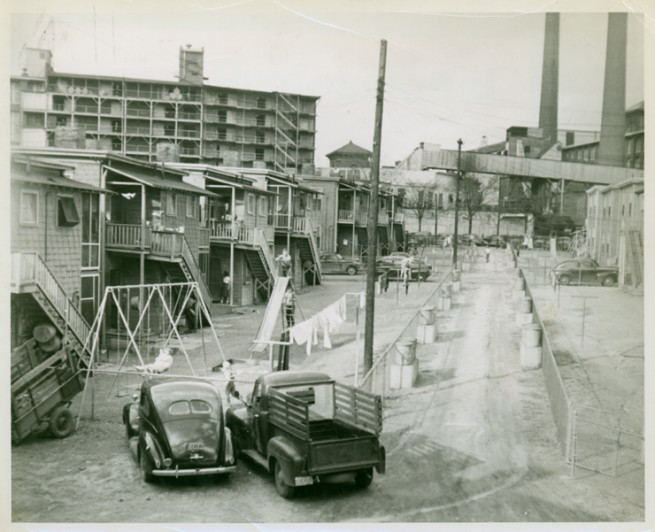 Children in the backyards of Cabbagetown homes